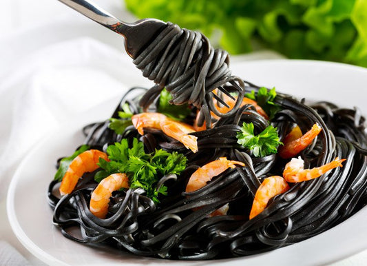 SQUID INK PASTA WITH KING PRAWNS AND FRESH HERB SAUCE